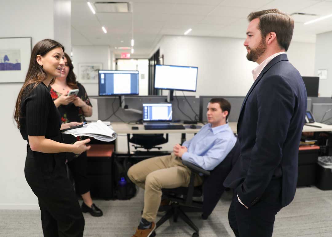 IGI team employees working