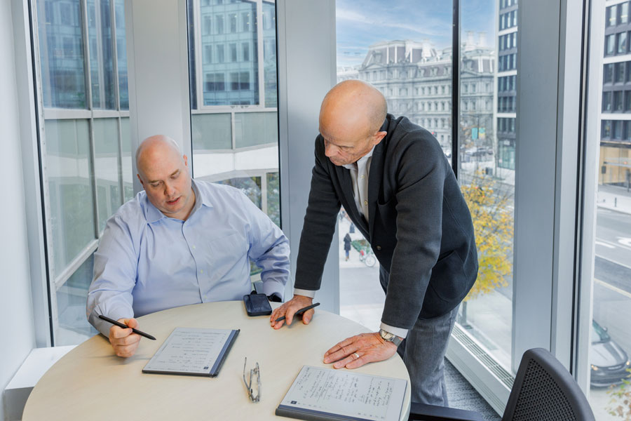 IGI employees working together